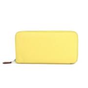 Pre-owned Leather wallets Hermès Vintage , Yellow , Dames