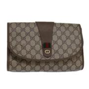 Pre-owned Leather clutches Gucci Vintage , Beige , Dames