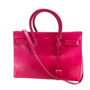 Pre-owned Leather handbags Yves Saint Laurent Vintage , Pink , Dames