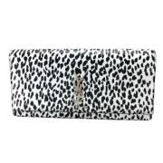 Pre-owned Leather clutches Yves Saint Laurent Vintage , White , Dames