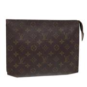 Pre-owned Canvas pouches Louis Vuitton Vintage , Brown , Dames