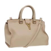 Pre-owned Leather handbags Yves Saint Laurent Vintage , Beige , Dames