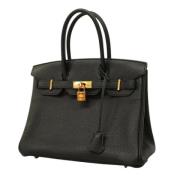 Pre-owned Leather handbags Hermès Vintage , Black , Dames