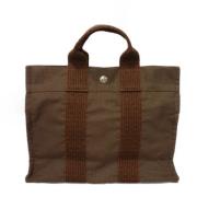 Pre-owned Nylon handbags Hermès Vintage , Brown , Dames