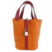 Pre-owned Leather handbags Hermès Vintage , Orange , Dames