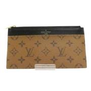 Pre-owned Plastic wallets Louis Vuitton Vintage , Beige , Dames