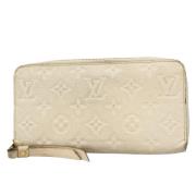 Pre-owned Fabric wallets Louis Vuitton Vintage , Beige , Dames