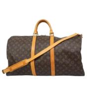 Pre-owned Canvas travel-bags Louis Vuitton Vintage , Brown , Dames