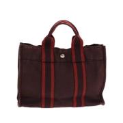 Pre-owned Canvas handbags Hermès Vintage , Red , Dames