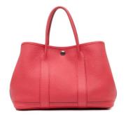 Pre-owned Leather handbags Hermès Vintage , Pink , Dames