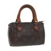 Pre-owned Canvas handbags Louis Vuitton Vintage , Brown , Dames