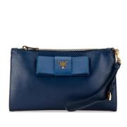 Pre-owned Leather clutches Prada Vintage , Blue , Dames