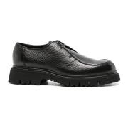 Zwarte leren veterschoenen met platte zool Doucal's , Black , Heren