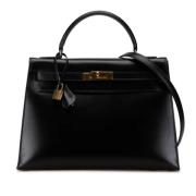 Pre-owned Leather handbags Hermès Vintage , Black , Dames