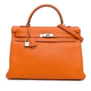 Pre-owned Leather handbags Hermès Vintage , Orange , Dames