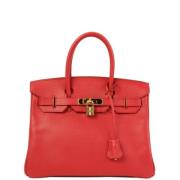 Pre-owned Canvas handbags Hermès Vintage , Red , Dames