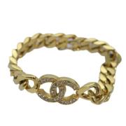 Pre-owned Metal bracelets Chanel Vintage , Yellow , Dames