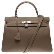 Pre-owned Leather handbags Hermès Vintage , Brown , Dames