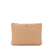 Pre-owned Leather clutches Chanel Vintage , Beige , Dames