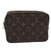 Pre-owned Canvas pouches Louis Vuitton Vintage , Brown , Dames