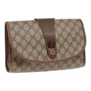 Pre-owned Leather clutches Gucci Vintage , Beige , Dames