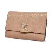 Pre-owned Fabric wallets Louis Vuitton Vintage , Beige , Dames