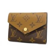 Pre-owned Fabric wallets Louis Vuitton Vintage , Brown , Dames