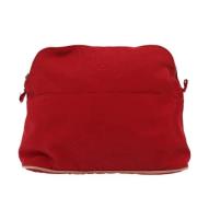 Pre-owned Canvas clutches Hermès Vintage , Red , Dames