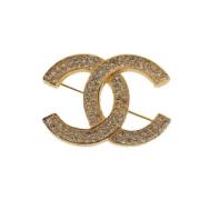 Pre-owned Metal brooches Chanel Vintage , Yellow , Dames