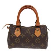 Pre-owned Canvas handbags Louis Vuitton Vintage , Brown , Dames