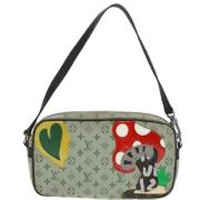 Pre-owned Canvas pouches Louis Vuitton Vintage , Green , Dames