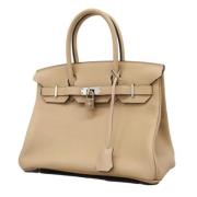 Pre-owned Leather handbags Hermès Vintage , Beige , Dames