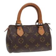 Pre-owned Canvas handbags Louis Vuitton Vintage , Brown , Dames