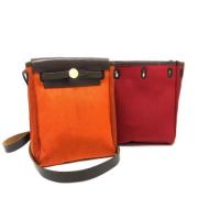 Pre-owned Leather shoulder-bags Hermès Vintage , Orange , Dames