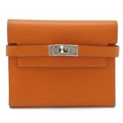 Pre-owned Leather wallets Hermès Vintage , Orange , Dames