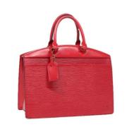 Pre-owned Leather handbags Louis Vuitton Vintage , Red , Dames