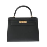 Pre-owned Leather handbags Hermès Vintage , Black , Dames