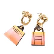 Pre-owned Fabric earrings Hermès Vintage , Yellow , Dames