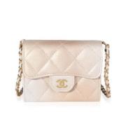 Pre-owned Leather clutches Chanel Vintage , Beige , Dames