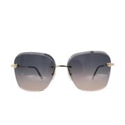 Pre-owned Metal sunglasses Cartier Vintage , Yellow , Dames