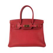 Pre-owned Leather handbags Hermès Vintage , Red , Dames