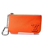 Pre-owned Canvas wallets Louis Vuitton Vintage , Orange , Unisex