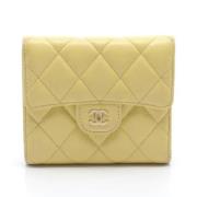 Pre-owned Leather wallets Chanel Vintage , Yellow , Dames