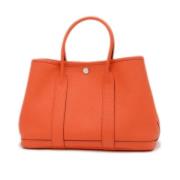 Pre-owned Leather handbags Hermès Vintage , Orange , Dames