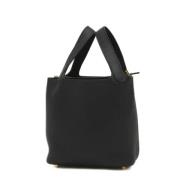 Pre-owned Leather handbags Hermès Vintage , Black , Dames