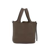 Pre-owned Leather handbags Hermès Vintage , Brown , Dames