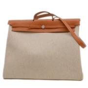 Pre-owned Leather handbags Hermès Vintage , Beige , Dames