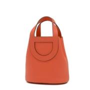 Pre-owned Leather handbags Hermès Vintage , Orange , Dames