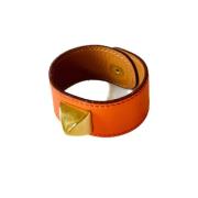 Pre-owned Leather bracelets Hermès Vintage , Orange , Dames