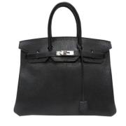 Pre-owned Leather handbags Hermès Vintage , Black , Dames